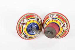 (2) antique tin litho spinning tops