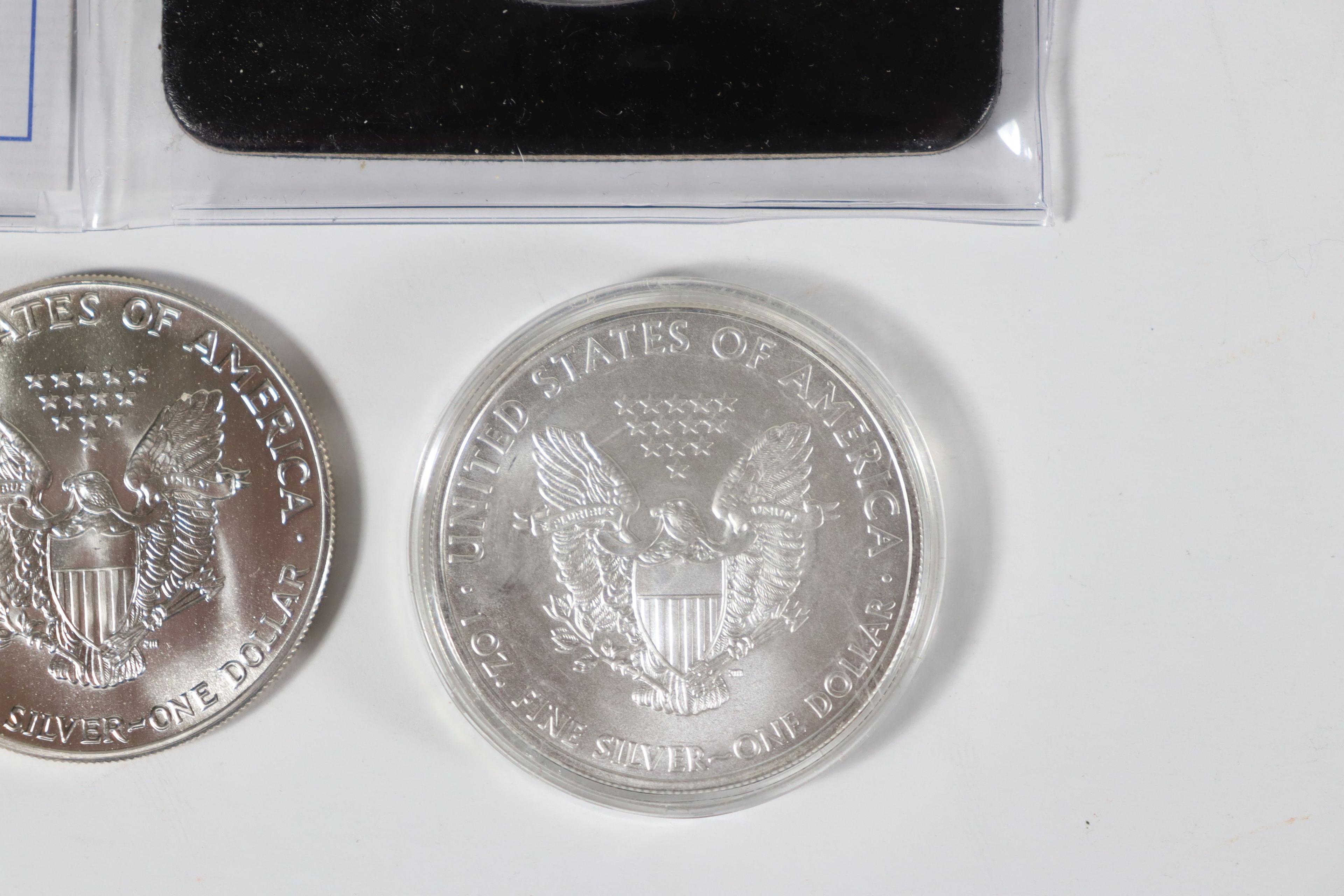 Group of (4) 1oz Silver Eagles