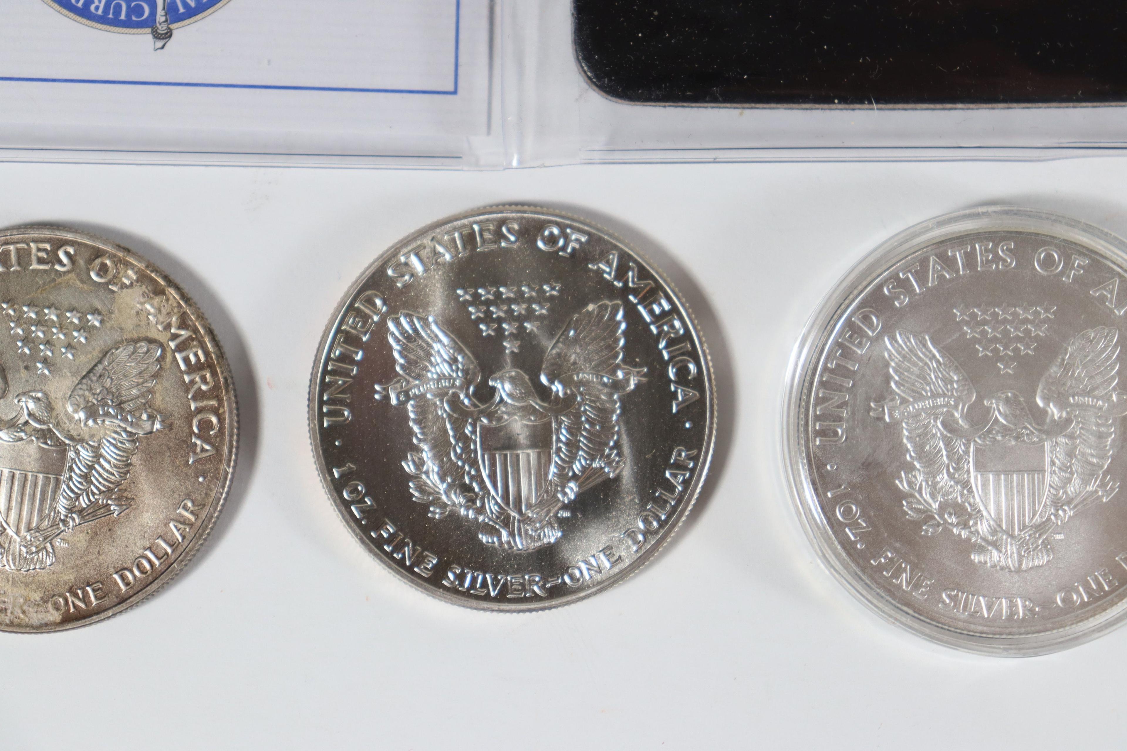 Group of (4) 1oz Silver Eagles