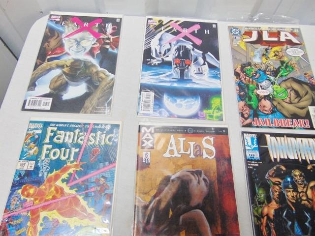 Lot Of 12 Comic Books In Plastic W/ Cardboard Backs