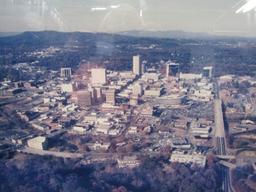 Aerial Photograph Of Downtown Greenville, S. C. W/ Paris Mountain In Background