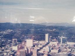 Aerial Photograph Of Downtown Greenville, S. C. W/ Paris Mountain In Background