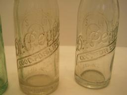 2 Clear/Green Dr. Pepper 6 1/2oz. Bottles w/ Clock "Drink A Bite To Eat at 10, 2 & 4" Slogan