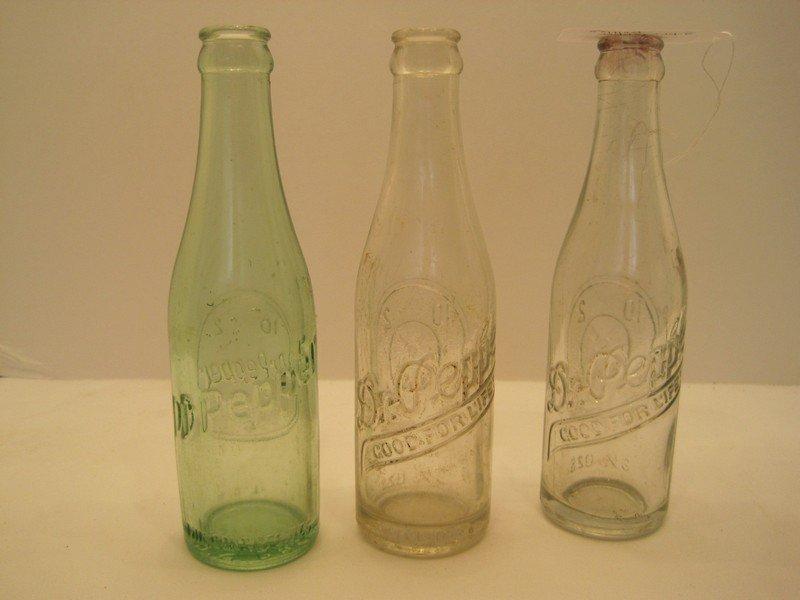 2 Clear/Green Dr. Pepper 6 1/2oz. Bottles w/ Clock "Drink A Bite To Eat at 10, 2 & 4" Slogan