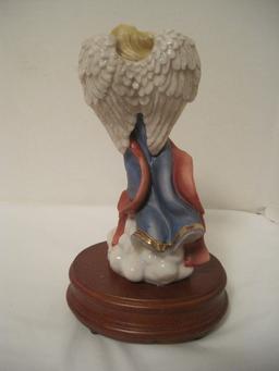 Dillard's Trimming Porcelain Angel Playing Violin Figural Music Box on Wooden Base