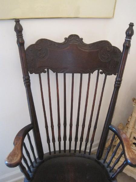 Dark Stain Spindle Pressed Back Curved Arm Chair