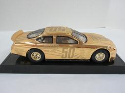 Racing Champions 1995 NASCAR Fans 50th Anniversary Ford Taurus Goldtone