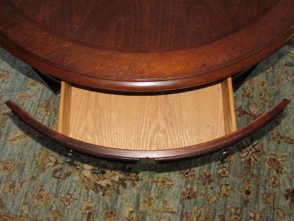 4 Wooden Drawer Round Coffee Table Narrow To Caster Feet, Grooved Columns Panel Motif