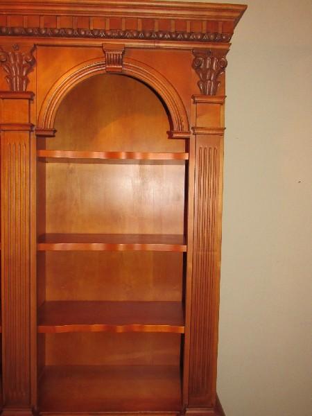 Tall Wooden Shelving w/ 2 Lower Doors, Grooved Columns, Panel Motif, 4-Tier w/ Wave Trim