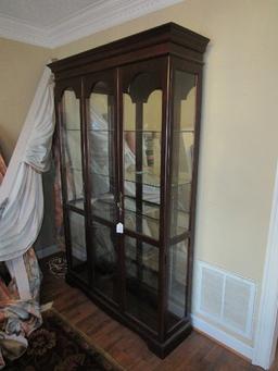 Tall Dark Wooden Display Cabinet 4 Glass Shelves, 2 Brass Pulls, 2 Doors, Curved Skirt