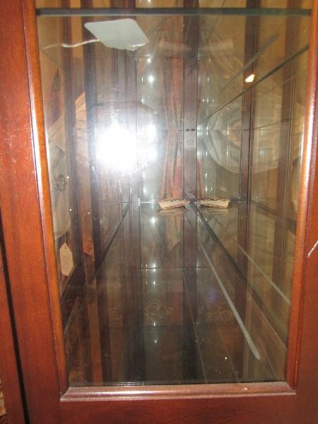 Tall Dark Wooden Display Cabinet 4 Glass Shelves, 2 Brass Pulls, 2 Doors, Curved Skirt