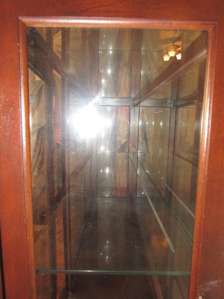 Tall Dark Wooden Display Cabinet 4 Glass Shelves, 2 Brass Pulls, 2 Doors, Curved Skirt