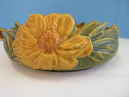 Roseville Pottery Peony Pattern Embossed Large Yellow Flowers Textured Yellow Background