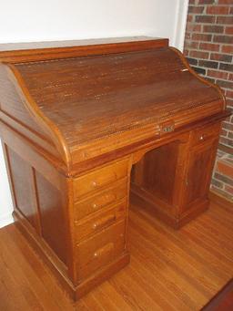 Stately Oak Executive Roll Top Desk Features Fitted Interior w/ Pigeonholes