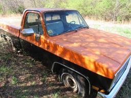 1986 Orange and Black GMC Truck