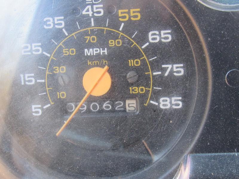 1986 Orange and Black GMC Truck