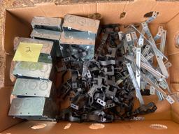 Box of metal junction boxes, beam clamps and clips