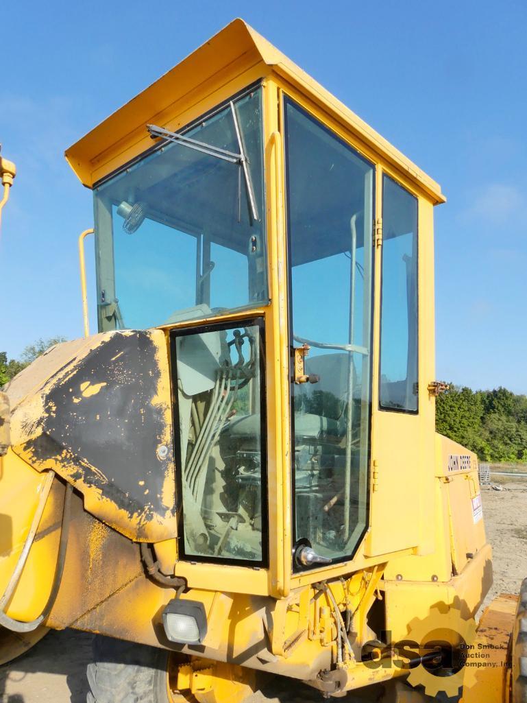 1988 Deere 570B Motor Grader, S/N DW570BX516542RG, Scarifier, 12" Moldboard, Meter Reads 1,549 Hours