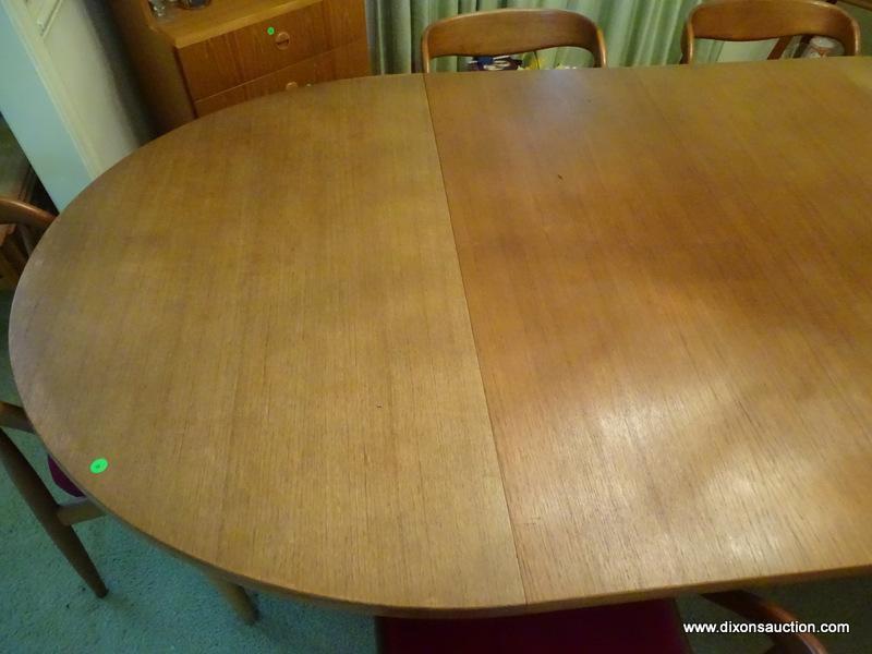 (DR) DANISH-MODERN DINING ROOM TABLE. HAS 2 LEAVES AND 6 DINING CHAIRS. LEAVES ARE 19'' WIDE EACH.