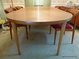 (DR) DANISH-MODERN DINING ROOM TABLE. HAS 2 LEAVES AND 6 DINING CHAIRS. LEAVES ARE 19'' WIDE EACH.