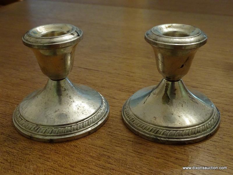 (DR) PAIR OF CROWN STERLING WEIGHTED CANDLE HOLDERS. 3'' TALL