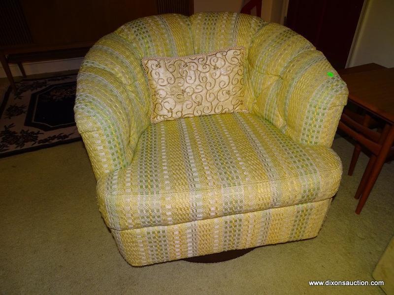 (FR) 1 OF A PAIR OF UPHOLSTERED BARREL BACK SWIVEL ARM CHAIRS. 30''X35''X27''