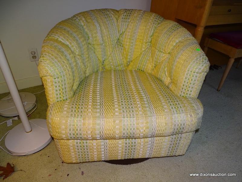 (FR) 1 OF A PAIR OF UPHOLSTERED BARREL BACK SWIVEL ARM CHAIRS. 30''X35''X27''