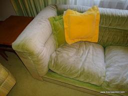 (FR) GREEN UPHOLSTERED 3 CUSHION SOFA. DOES SHOW SOME FADING BUT IN OTHER WISE VERY GOOD CONDITION.