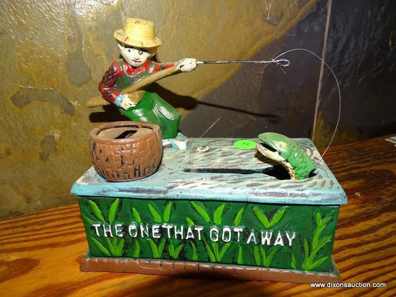 CAST IRON BANK OF A MAN FISHING "THE ONE THAT GOT AWAY" 7''X4''X7''