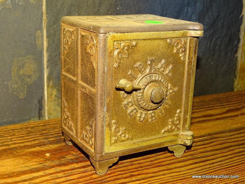 CAST IRON BANK IN THE SHAPE OF A SAFE. "IDEAL SECURITY". COMBINATION IS ON BACK. 4.25''X3.5''X5.5''