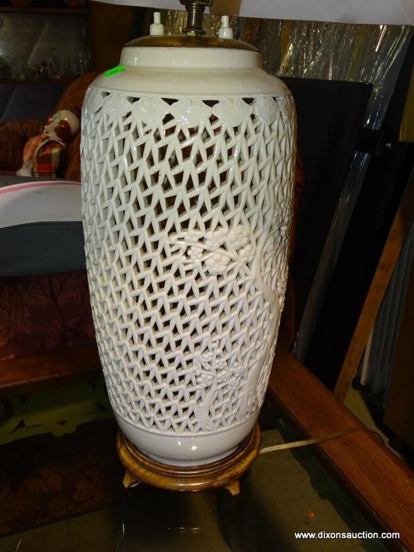 (W1) PORCELAIN RETICULATED ORIENTAL STYLE LAMP. HAS CLOTH SHADE: 8"x33". HAS FINIAL.