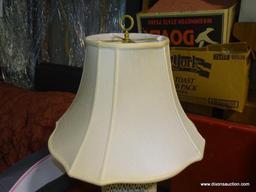 (W1) PORCELAIN RETICULATED ORIENTAL STYLE LAMP. HAS CLOTH SHADE: 8"x33". HAS FINIAL.