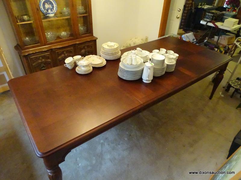 (DR) LIKE NEW HUGE FAMILY GATHERING DINING ROOM TABLE. HAS WALNUT WOOD TONE FINISH AND 2 BOARDS.