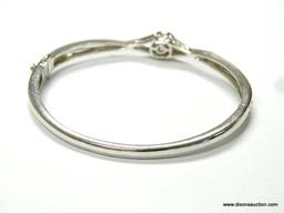 LADIES .925 STERLING SILVER 1/4 CT. DIAMOND FLOATING HEART DESIGNER BRACELET.