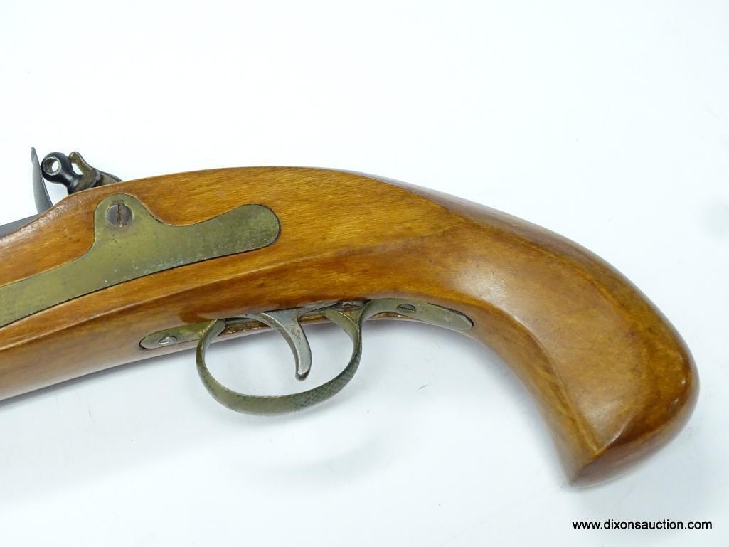 (SC) ENGRAVED FLINTLOCK PISTOL. BRASS TRIGGER GUARD. 11.5" LONG WITH AN OCTAGON BARREL. .44 CAL.