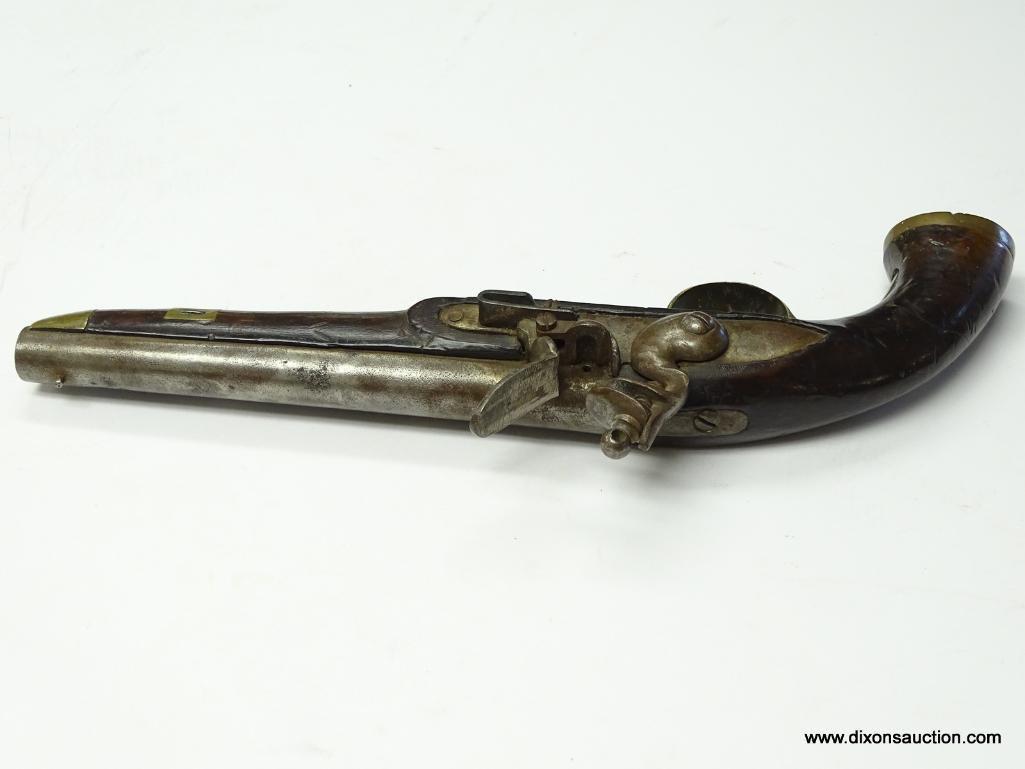 (SC) FLINTLOCK PISTOL HALLMARKED E/LG ON TOP OF THE BARREL. HAS A BRASS TRIGGER GUARD AND BUTT