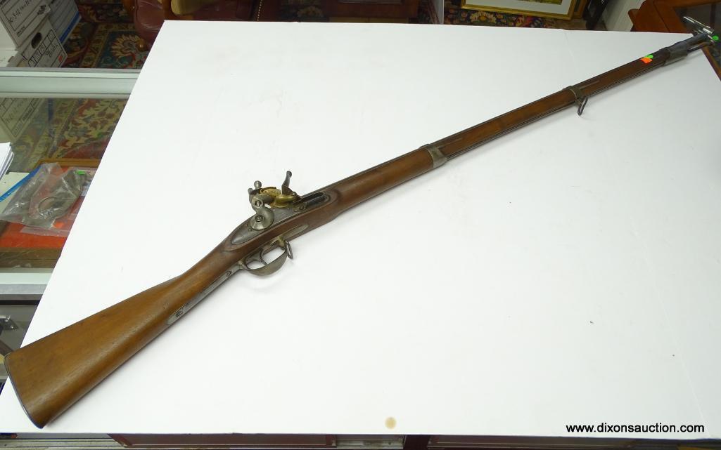 (SC) FLINTLOCK RIFLE WITH RAMROD. 57" LONG. MARKED: U.S. AND D. NIPPES PHILA. MARKED ON THE LEFT