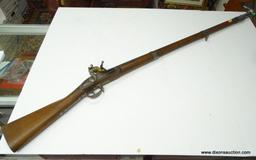 (SC) FLINTLOCK RIFLE WITH RAMROD. 57" LONG. MARKED: U.S. AND D. NIPPES PHILA. MARKED ON THE LEFT