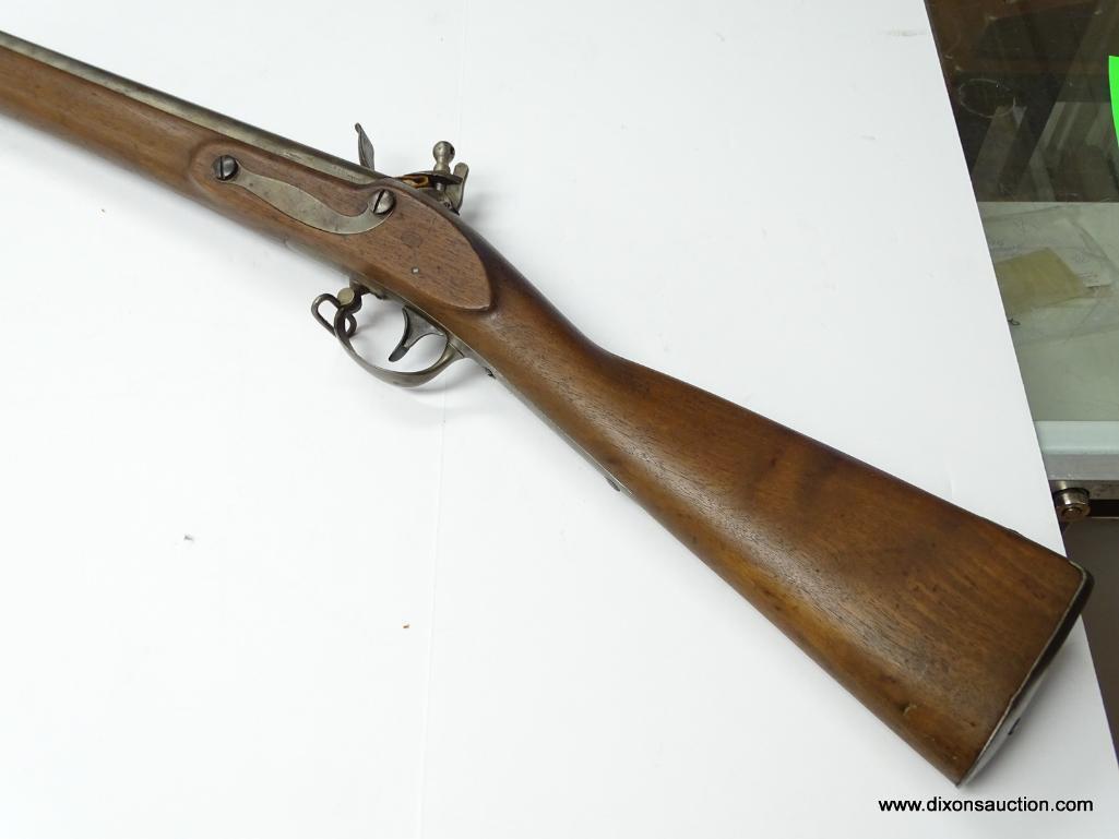 (SC) FLINTLOCK RIFLE WITH RAMROD. 57" LONG. MARKED: U.S. AND D. NIPPES PHILA. MARKED ON THE LEFT