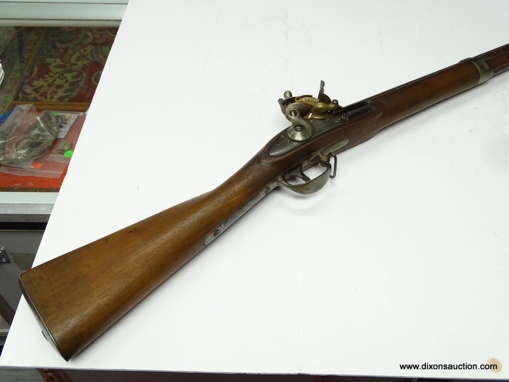 (SC) FLINTLOCK RIFLE WITH RAMROD. 57" LONG. MARKED: U.S. AND D. NIPPES PHILA. MARKED ON THE LEFT