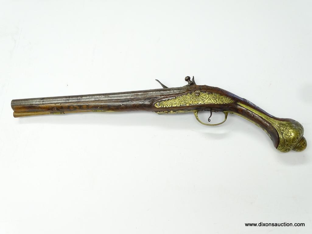 (SC) FLINTLOCK PISTOL HEAVILY ENGRAVED. 19" LONG. .58 CAL. BRASS HARDWARE ON HANDLE, TRIGGER