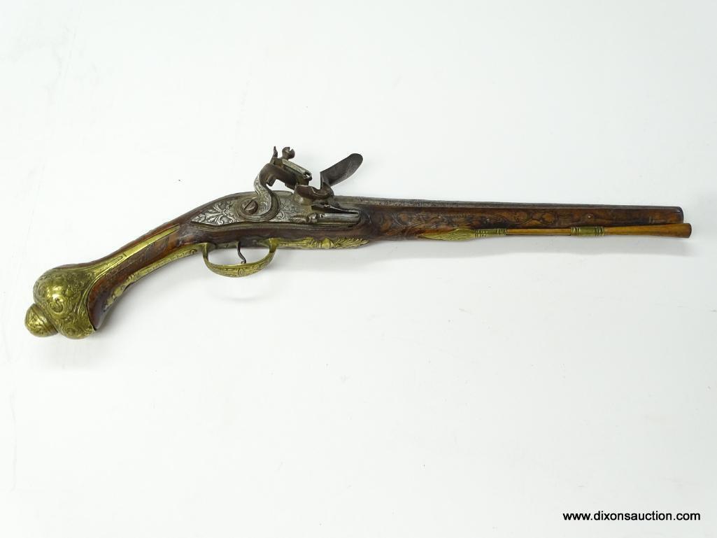 (SC) FLINTLOCK PISTOL HEAVILY ENGRAVED. 19" LONG. .58 CAL. BRASS HARDWARE ON HANDLE, TRIGGER