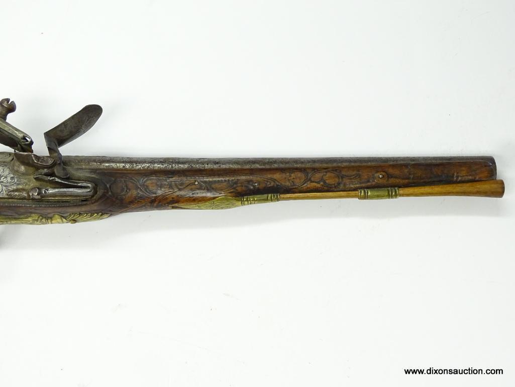 (SC) FLINTLOCK PISTOL HEAVILY ENGRAVED. 19" LONG. .58 CAL. BRASS HARDWARE ON HANDLE, TRIGGER