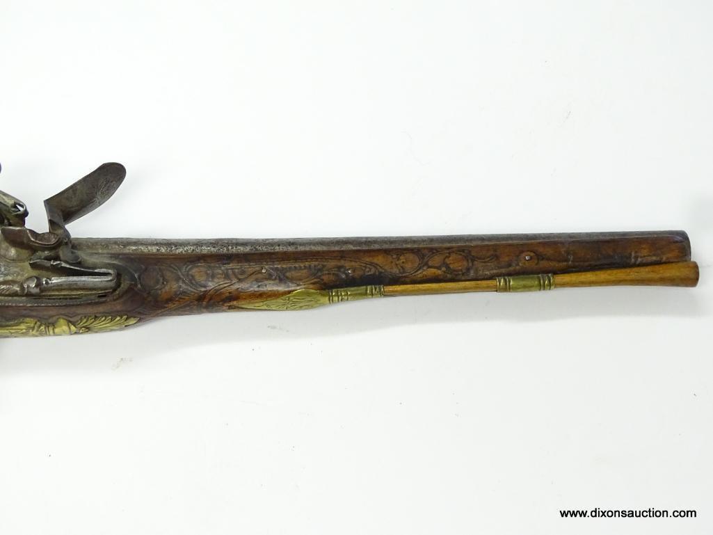 (SC) FLINTLOCK PISTOL HEAVILY ENGRAVED. 19" LONG. .58 CAL. BRASS HARDWARE ON HANDLE, TRIGGER