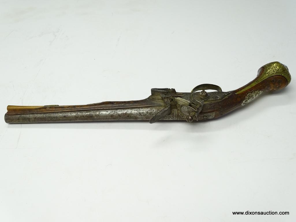 (SC) FLINTLOCK PISTOL HEAVILY ENGRAVED. 19" LONG. .58 CAL. BRASS HARDWARE ON HANDLE, TRIGGER