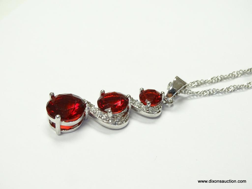 .925 CABLE TWIST NECKLACE WITH .925, RED CRYSTAL, AND WHITE CRYSTAL PENDANT