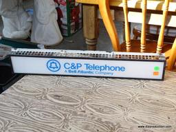 C&P TELEPHONE ADVERTISING SIGN. POSSIBLY FROM A TELEPHONE BOOTH: 24"x4"