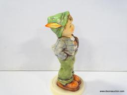 HUMMEL EXCLUSIVE EDITION FIGURINE WITH COA. HELLO WORLD. 5 3/8" TALL. HUM 429 # 399. IN THE ORIGINAL