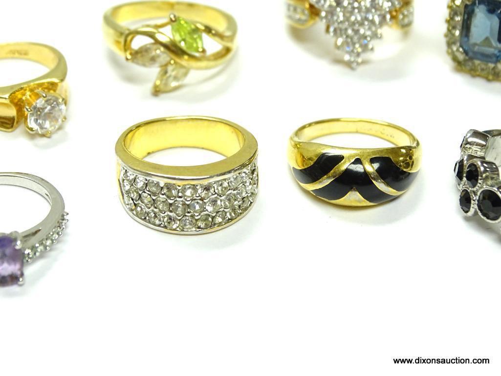 Lot of 15 rings right out of the jewelry box. Very pretty high fashion rings, look great