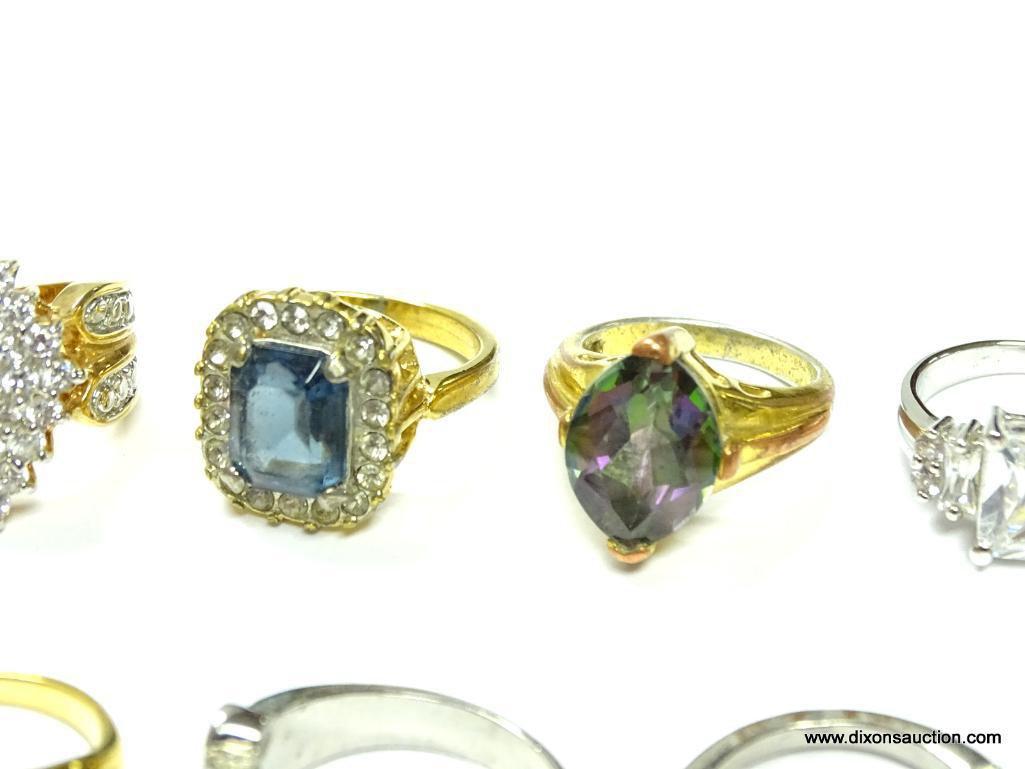 Lot of 15 rings right out of the jewelry box. Very pretty high fashion rings, look great